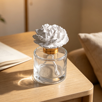 Diffuseur d'huiles essentielles en plâtre parfumé pour la maison, avec bouteille en verre de 100 ml et fleur en céramique, pour parfumer l'air