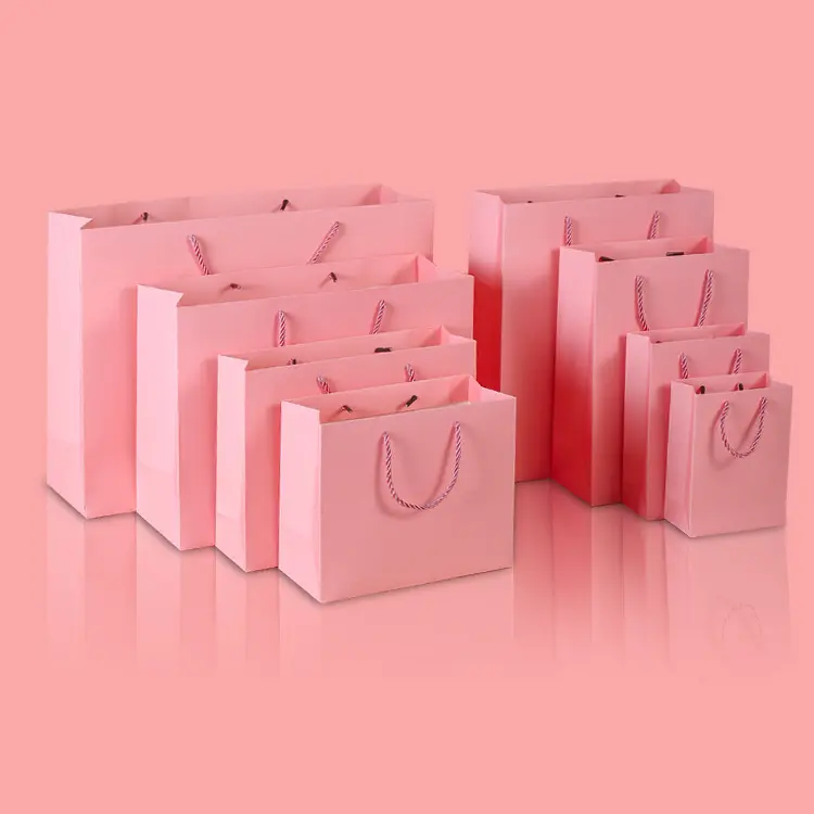 Sac en papier Kraft rose pour vêtements personnalisés, emballage de carte blanche, sac en papier Kraft pour cadeaux, peut ajouter un Logo, sacs de Shopping, 50 unités