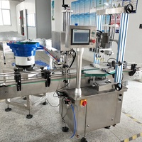 Machine de bouchage automatique pour bouteilles en plastique, machine de bouchage pour flacons cosmétiques en plastique