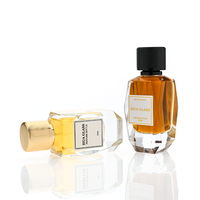 Flacon de parfum en verre de luxe de 50 ml avec étiquette adhésive, pompe dorée, flacon de parfum vide, fabricant de flacons de parfum avec bouchon en aluminium