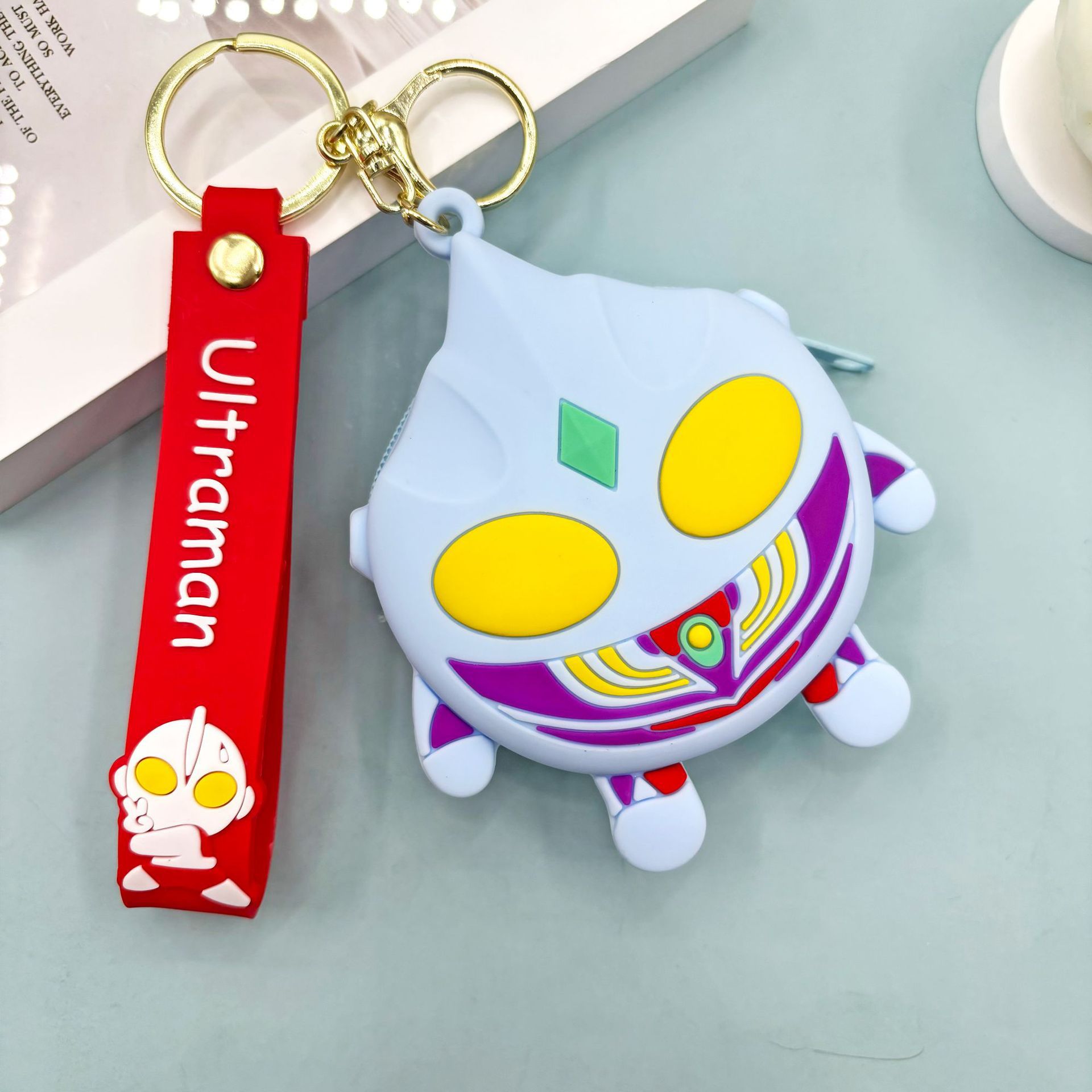 Monedero-ultraman-cordón de cuero-azul