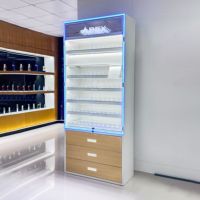 Système mural personnalisé APEX pour l'affichage du tabac avec éclairage LED à miroir infini, étagères à retour automatique, mobilier pour magasin de tabac