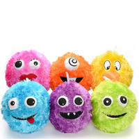 Balles rebondissantes en peluche avec visage souriant