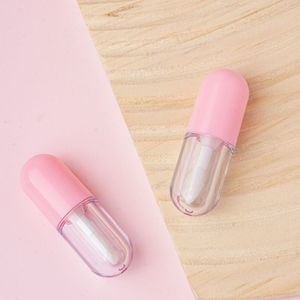 Tubo de brillo labial pequeño con tapa rosa y cuerpo transparente para rellenar brillo labial, capacidad de 5 ml, moldeado por inyección, origen China. - Product Image 1