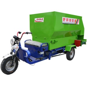 Triciclo alimentador automático para ganado, de metal verde, alimentador automático de alimento húmedo y seco, esparcidor de alimento eléctrico de tres ruedas - Product Image 1