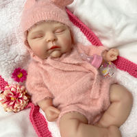 Poupée Reborn Bébé Fille en Silicone de 18 Pouces, Cheveux Noirs Bouclés, Oreilles Réalistes, Idéale pour Cadeaux d'Anniversaire et Artistes Reborn