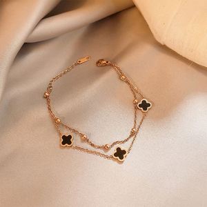 กำไลข้อมือรูปโคลเวอร์เรียบง่าย ทำจากสแตนเลสสตีล 18K สำหรับเด็กผู้หญิง สีดำ  สร้อยข้อมือสำหรับผู้หญิง - Product Image 3