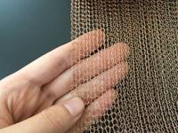Maille de cuivre tricotée de type ginning à fils multiples et ronds