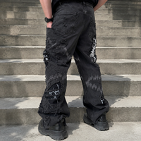 Jeans en denim noir personnalisé avec logo, effet vieilli, patchwork, ourlet brut, coupe ample, jambe large, style streetwear vintage pour homme – Vente en gros