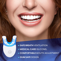 Vente en gros CE dentaire à la maison 2022 Kit de blanchiment des dents UV Logo privé Kit de blanchiment des dents professionnel avec lumière LED