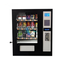 Petit distributeur de collations et de boissons personnalisable avec options de paiement en espèces