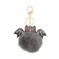 Vente en gros de porte-clés de Noël en peluche pour Halloween, boule bouffante en fourrure PU avec pompon et chauve-souris en alliage de zinc, porte-clés, pendentif à breloque pour