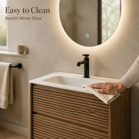 Meuble-lavabo mural en contreplaqué pour salle de bain avec vasque en céramique et miroir rond rétroéclairé par LED pour projets hôteliers et d'appartements