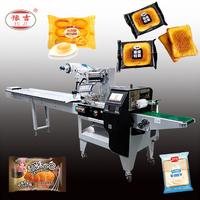Machine à emballer horizontale d'oreiller de nourriture d'emballage de paquet de flux de biscuit de barre de chocolat automatique manuelle à bas prix