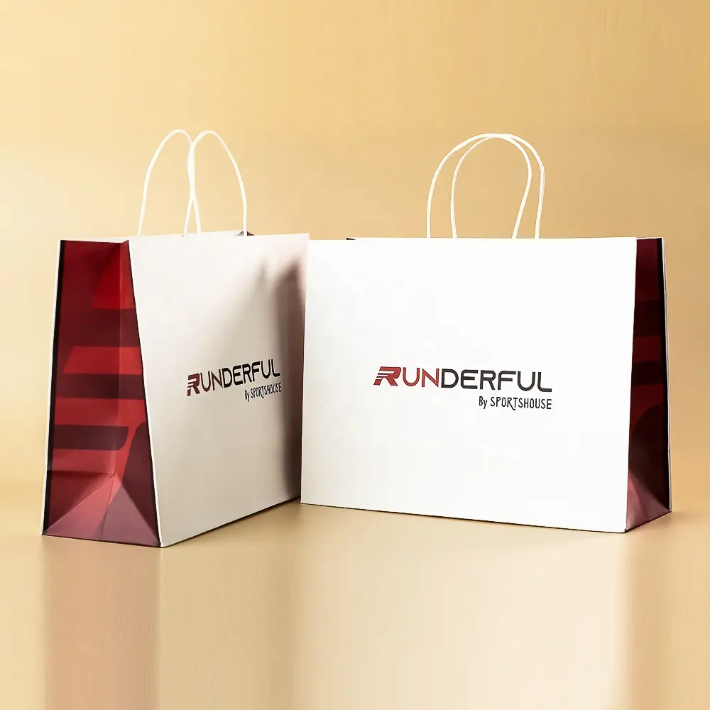 Bolsa de papel de embalaje al por mayor impresión personalizada Logotipo de fabricación kraft de lujo pequeñas compras reciclables