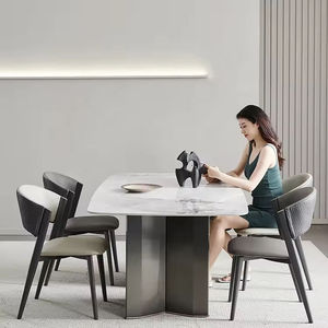 Set da pranzo in marmo bianco stile nordico con quattro sedie, un tavolo rettangolare elegante per l'arredamento moderno della casa. - Product Image 3
