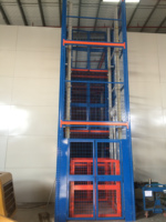 Plateforme élévatrice de fret hydraulique à chaîne pour entrepôt, avec rail de guidage vertical et moteur mural, pour la construction