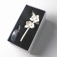 Diffuseur de parfum d'ambiance en pierre de plâtre parfumée aux fleurs, fait main, en céramique, avec bouteille en verre de 100 ml, pour huiles essentielles et parfums d'intérieur