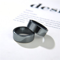 Prix d'usine, vente en gros, bague de santé en pierre naturelle de guérison, forme ondulée, hématite noire, bague facettée magnétique pour homme et femme