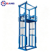 Monte-charge électrique hydraulique TAIGANG TGSJD pour entrepôt, monté au mur, avec commande sans fil, hauteur de levage 16 m, capacité 1 tonne