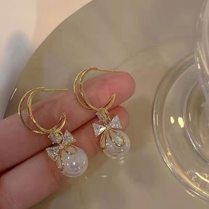 New Sweet Imitation Pearl Drop Silver <b>Post</b> C-shaped Diamond Rhinestone <b>Earring</b> Lady Korean Design Fashionable Bow <b>Earrings</b> - Product Image 4