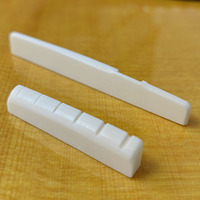 Set Bridge Gitar Folk YMH dari Tulang Sapi Asli dengan Kemasan dalam Kantong