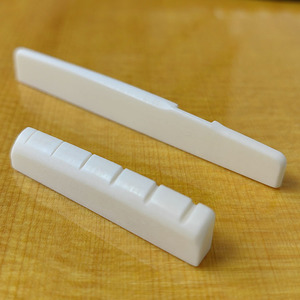 Juego de puente de hueso de vaca puro <span class=keywords><strong>para</strong></span> <span class=keywords><strong>guitarra</strong></span> folk YMH con embalaje en bolsa - Product Image 1