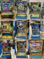 Boîtier de réglage du code et décodeur pour machines de jeu d'arcade à monnayeur