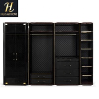 Armoire de luxe noire brillante avec portes vitrées et éclairage LED pour chambre et dressing
