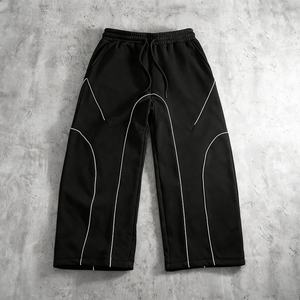กางเกงลำลองสไตล์อเมริกันลายทางไนลอนดีไซน์ใหม่ขายดีประจำปี 2026 ทรงหลวมสไตล์สตรีทใส่ได้ทุกฤดู กางเกงกีฬาลำลองสำหรับผู้ชาย - Product Image 1