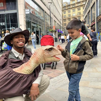 Costume de dinosaure réaliste grandeur nature léger bleu avec son de rugissement pour adultes, idéal pour les parcs d'aventure et l'utilisation scolaire