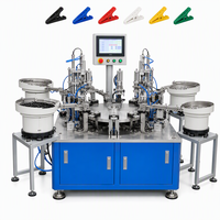 Machine d'assemblage de pinces à linge en plastique entièrement automatique à haute efficacité QFW