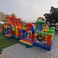 Parc de jeux gonflable coloré 14MX7M avec toboggan, parcours d'obstacles, terrain de jeux Yuedong, château en PVC