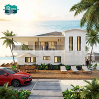 Villas modulaires préfabriquées à deux étages en structure légère en acier moderne pour usage en bord de mer, bureau, salle de sport, salle de bain - Écologiques et solaires