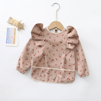 Tabliers pour enfants personnalisés en polyester 100% PU imperméables smockés à manches longues produits pour bébés tablier à bavette d'entraînement