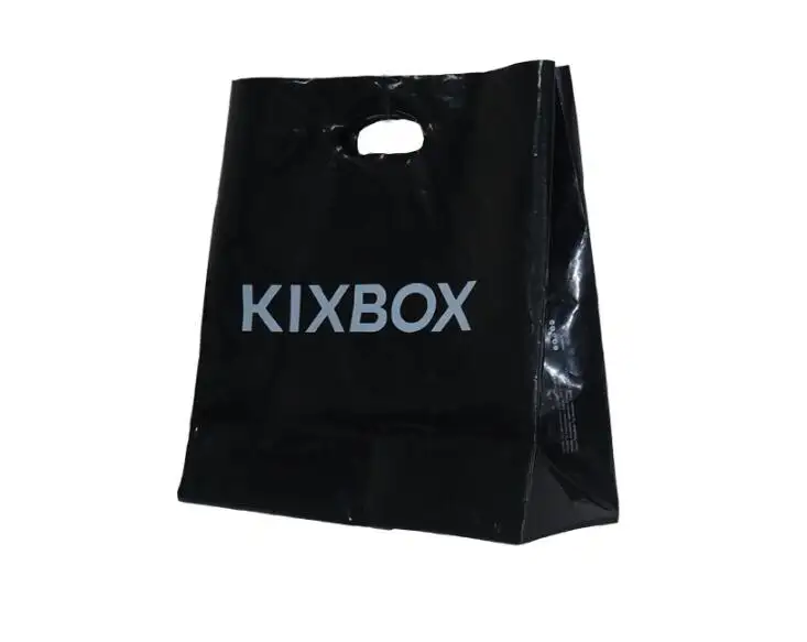 Vente en gros de sacs à provisions d'emballage avec logo personnalisé en plastique PE-BD de couleur noire avec poignée de poinçon pour l'emballage de vêtements