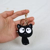 Vente en gros de jouets animaux en tricot amigurumi mignons, porte-clés chaton noir en crochet, breloques de sac pour filles