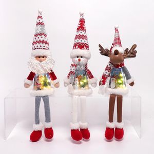 Figuras Musicales Navideñas Jolly, 3 Piezas, Santa Claus, Muñeco de Nieve y Reno con Patas Móviles que se Iluminan - Product Image 1