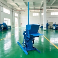 Machine manuelle QMR2-40 pour la fabrication de briques de terre emboîtables et de pavés en terre, très demandée