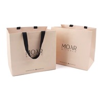 Impression de logo personnalisé Sac en papier texturé de luxe Sacs d'emballage cadeau cosmétique