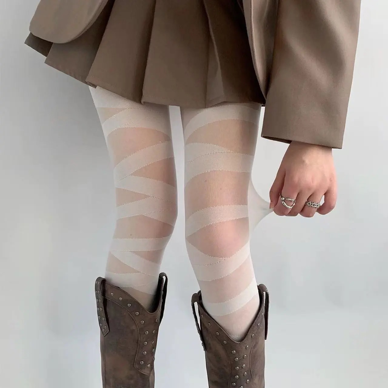 Straight-stitched white bandage