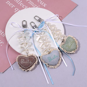 Ruban Cravate Porte-clés Pendentif Perle Bowknot Suspendu Dentelle Garniture Tissu En Forme De Coeur Plein De Charme De Fille - Product Image 3