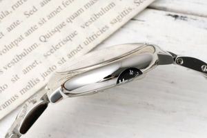 Montre à quartz haut de gamme, best-seller, élégante et simple, en acier inoxydable, 33 mm, avec couronne en pierres précieuses, montre à quartz haut de gamme pour femmes - Product Image 4