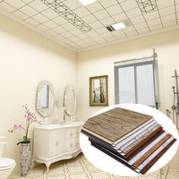 Panneau mural en bois stratifié décoratif unique et nouveau, panneau mural en PVC bon marché, faux plafond en PVC, imperméable, ignifuge, résistant à l'humidité