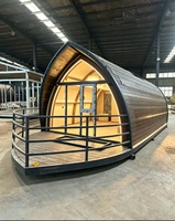 Maisonnette préfabriquée en acier OEM, forme de bateau arqué, type boathouse, capsule, tentes et maisons pliables