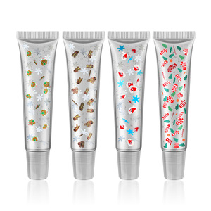 Brillo labial navideño Herorange en tubo transparente con diseño de renos y Santa Claus con brillantina, ideal para regalo navideño. - Product Image 3