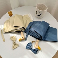 Parapluie manuel pliable en trois sections, élégant, en forme de tête de canard, protection UPF 50+, haut de gamme, unisexe, anti-UV, pour le soleil et la pluie