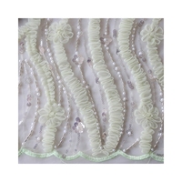 Tissu de broderie tissé de conception exquise 100% polyester brodé de motifs floraux perle et paillettes pour Costume