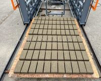 Machine automatique de fabrication de blocs de béton QT10-15, haute capacité, industrielle, avec PLC Siemens, moteur et boîte de vitesses robustes pour la production de briques