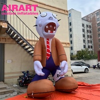 Des personnages d'Halloween zombies gonflables géants de 4.5 mètres décorent la publicité pour Halloween